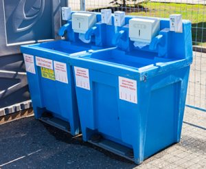 two blue portable hand wash stations next to eachother